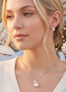 Woman wearing Millennial Collection Sunburst Necklace and Bracelet