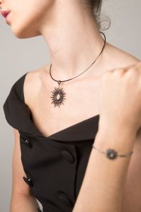 Woman wearing Millennial Collection Sunburst Necklace and Bracelet